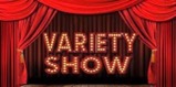 Stage with closed red curtains and Variety Show sign
