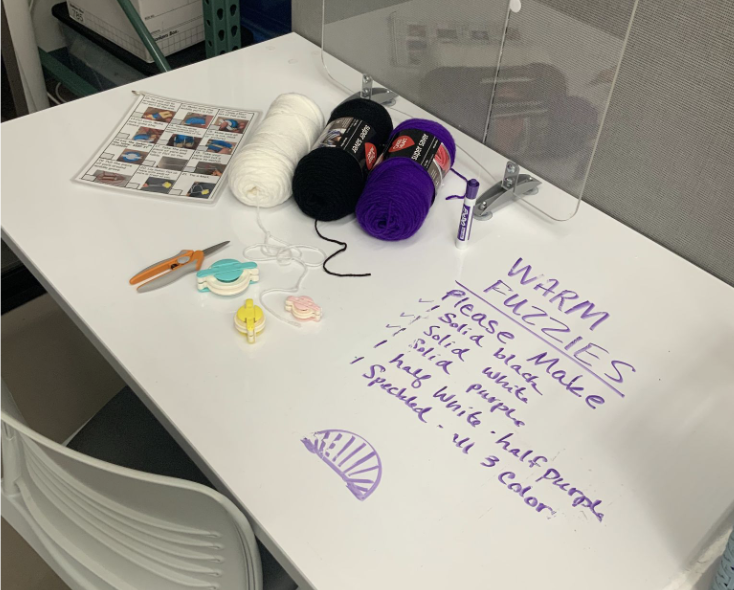 Yarn and craft supplies on a desk